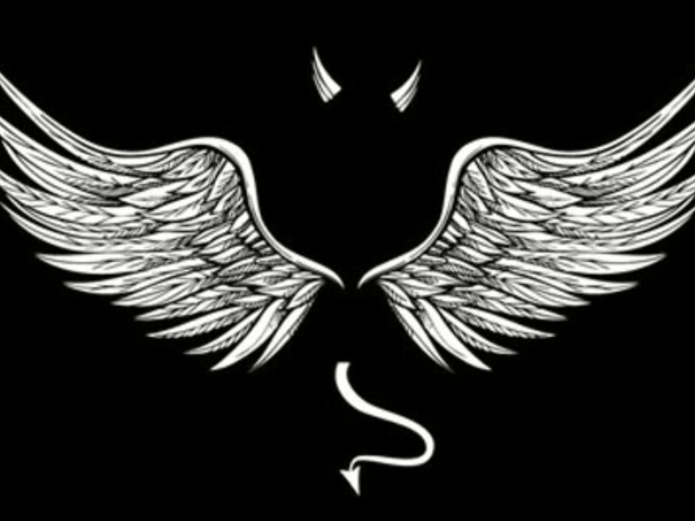 Ангел с крыльями в темноте