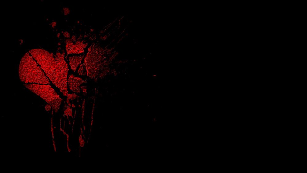 Разбитое сердце на черном фоне