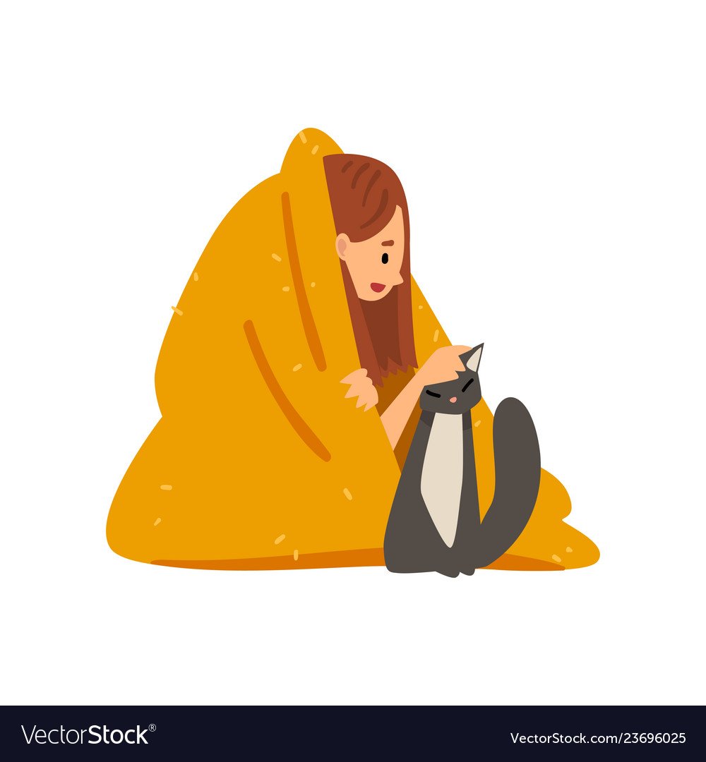 Девочка сидит под пледом