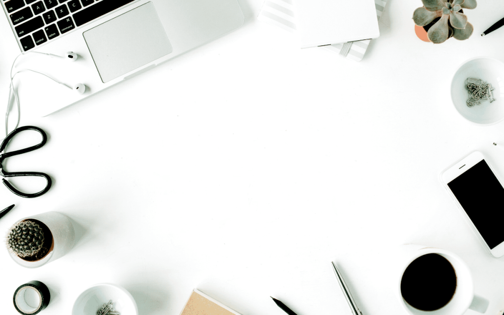 Белый стол с предметами вид сверху
