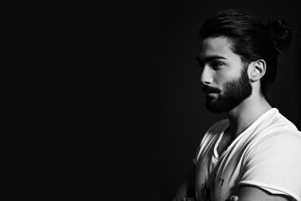 Мужской стрижка борода на черном фоне