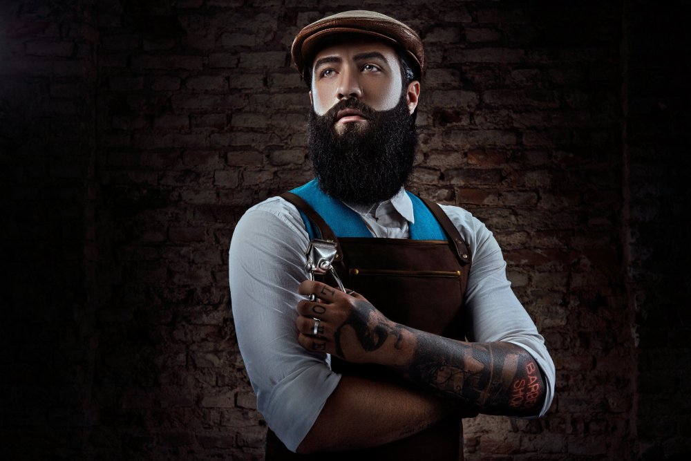 Мужик с бородой для барбершопа