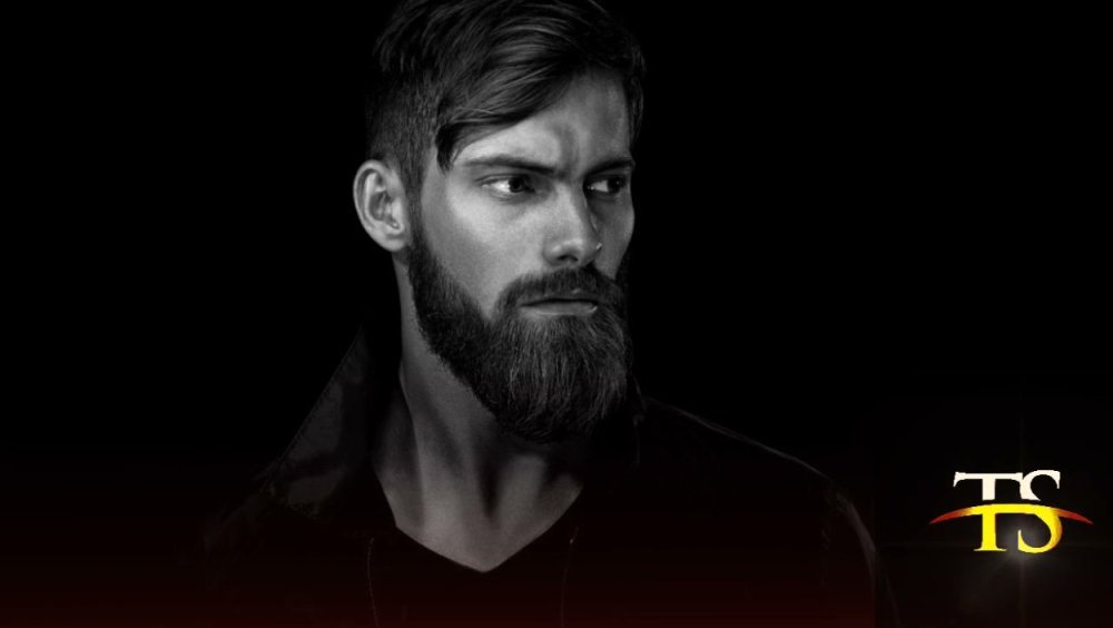 Бородатый мужик на черном фоне