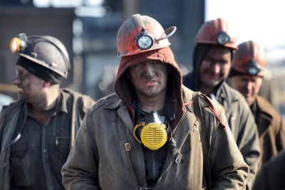 Рабочие в шахте