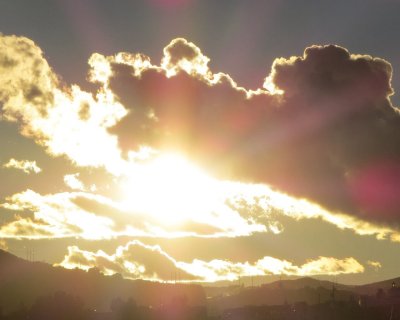 Солнце из за облаков