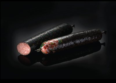 Колбаса на черном фоне